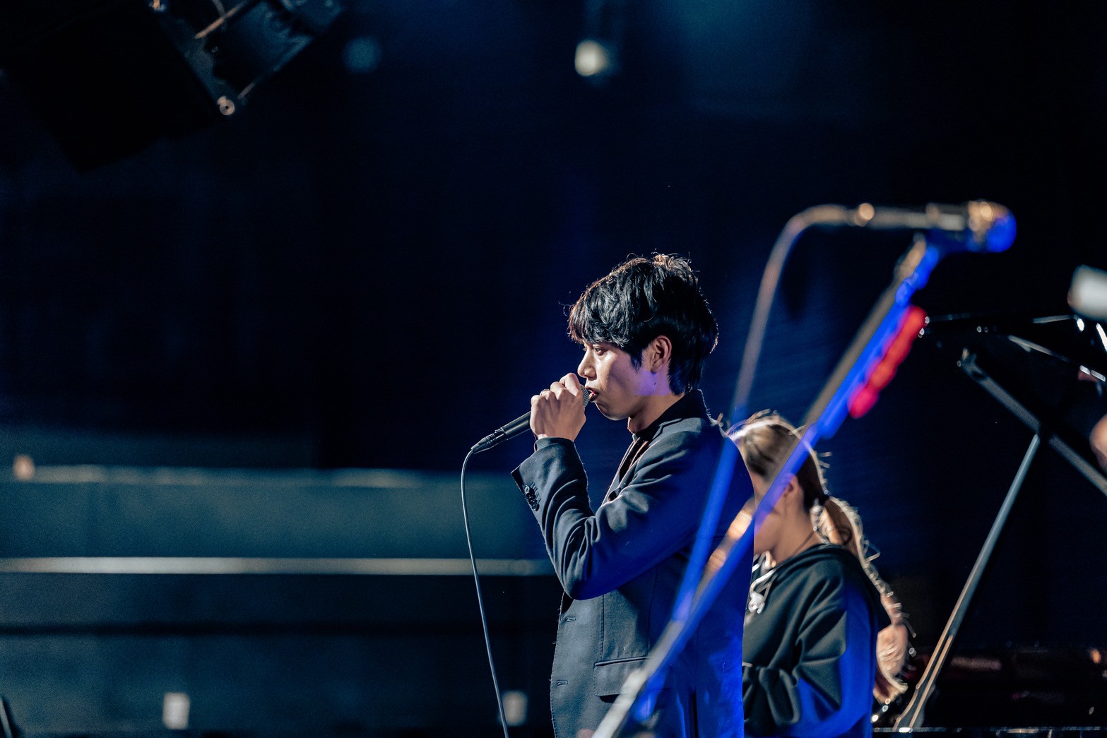 ボーカルとしてステージに立つ